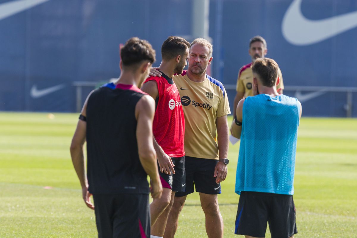 Barcelona manager Hansi Flick and Eric Garcia