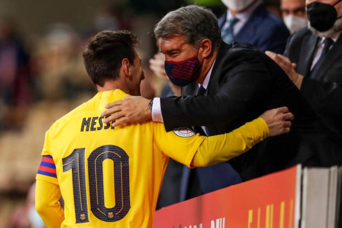 Lionel Messi and joan laporta